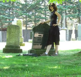 skirt,black,shirt,mouse ears,gravestone