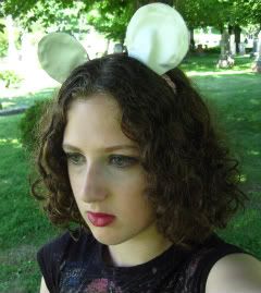 silver,mouse ears,black eyeshadow,dark lips,pale skin,curly,brown,hair