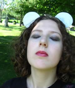 silver,mouse ears,black eyeshadow,dark lips,pale skin,curly,brown,hair